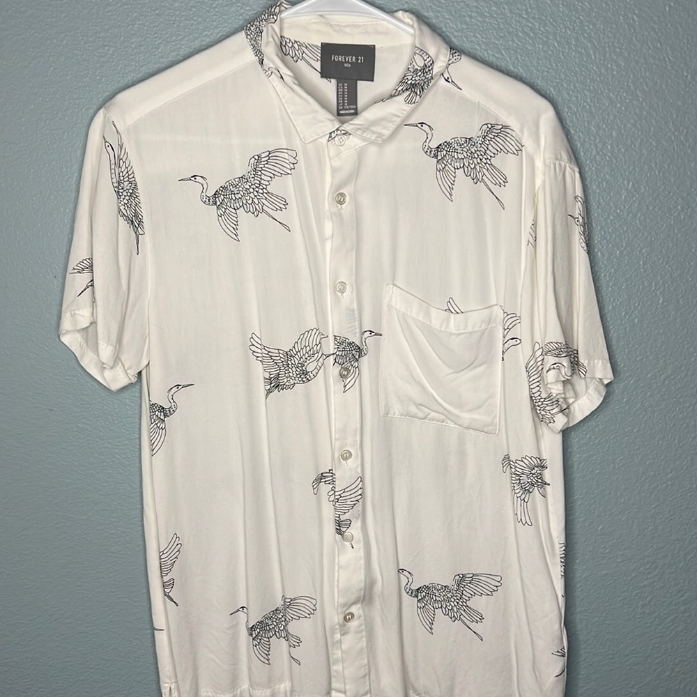 white shirt sleeve button up cranes